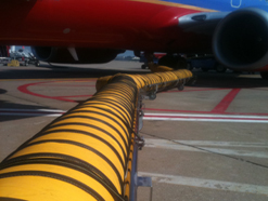 PCA hose trolley extended to aircraft